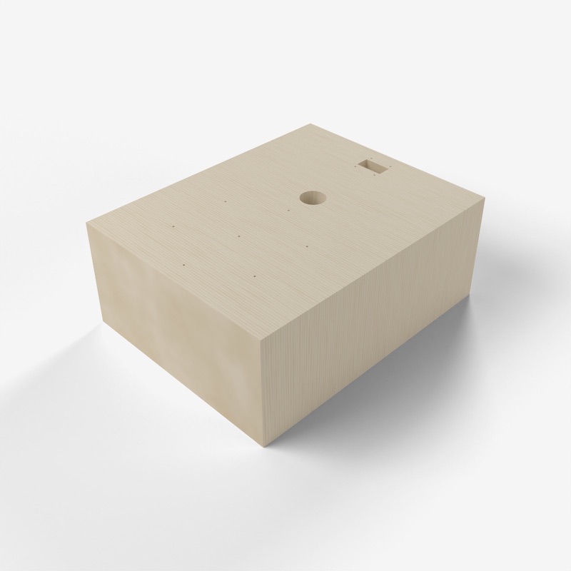 The base turned round, showing the same top face from the other side.