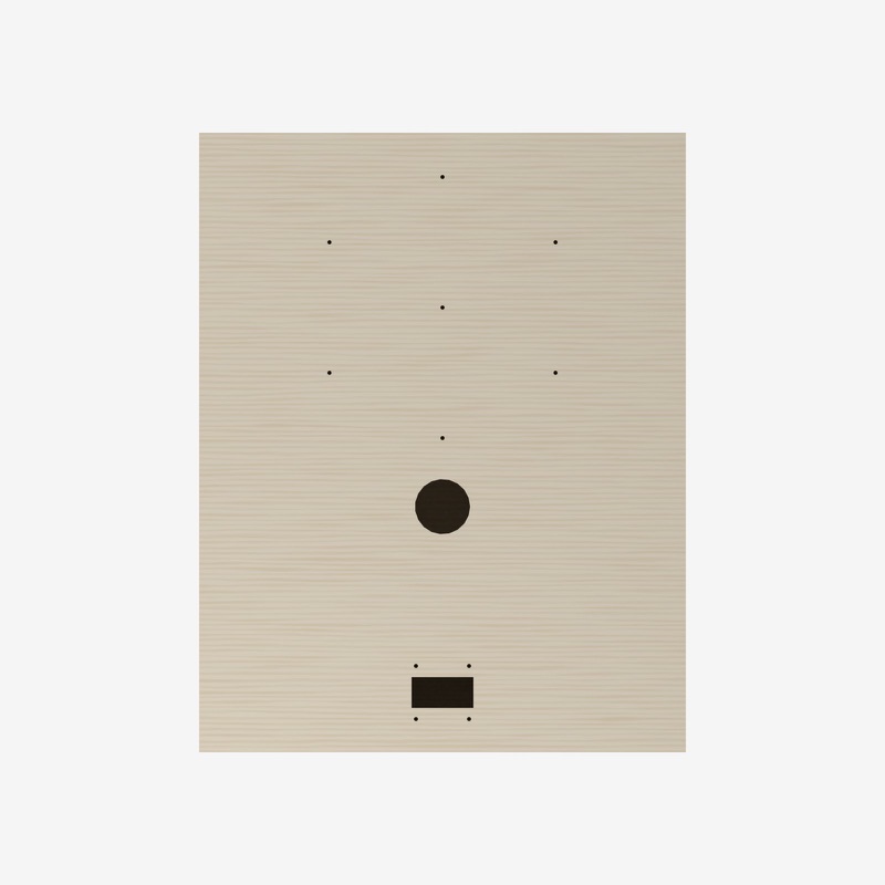 Plan view of the base from above: the round hole, the square opening near one edge and a pattern of small pin holes.