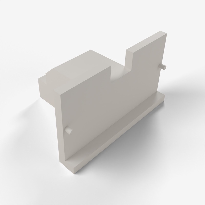 The bracket turned round: the plain face of the back plate with its notch, a small peg on each side and a lip along the bottom.